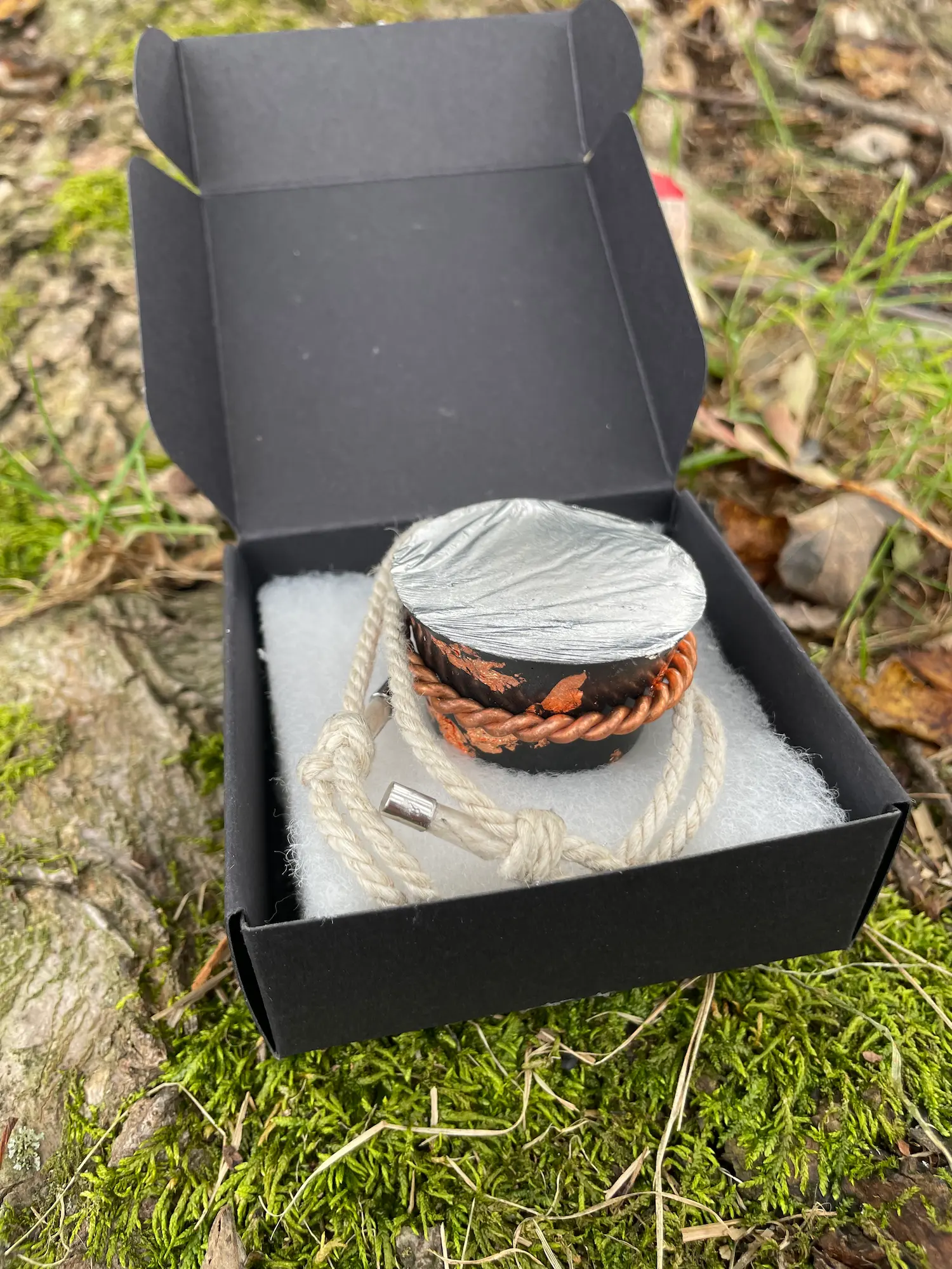 Boxed Halo Hanger necklace with one Peace Puck